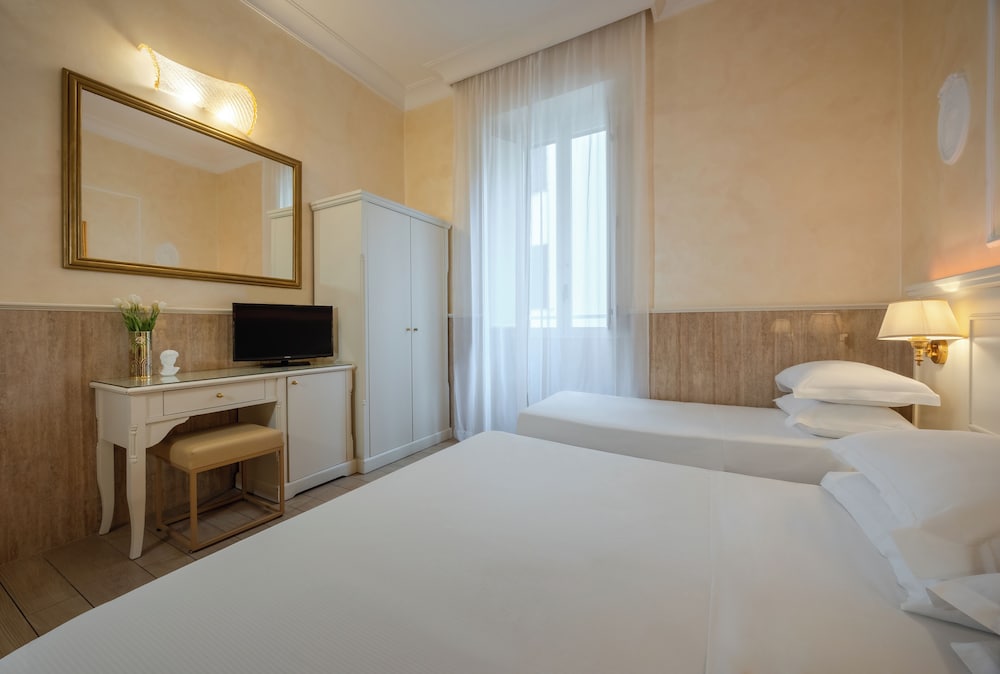 Habitación Cuádruple Estándar del hotel Palladium Palace. Foto 4