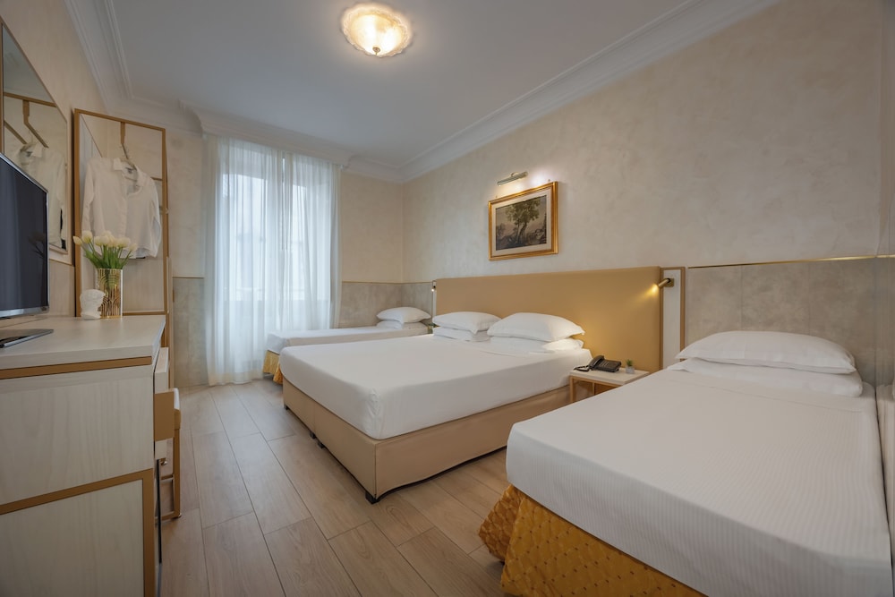 Habitación Cuádruple Estándar del hotel Palladium Palace. Foto 5