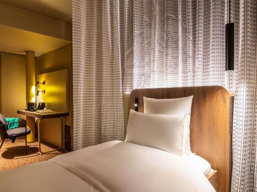 Habitación Solo Extra TRIBE adaptada para personas con movilidad reducida del hotel Tribe Dusseldorf