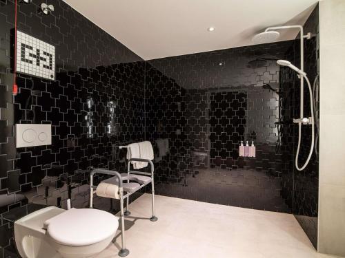 Habitación Solo Extra TRIBE adaptada para personas con movilidad reducida del hotel Tribe Dusseldorf. Foto 4