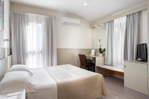 Habitación con 1 cama doble o 2 individuales - Anexo del hotel Grifone Firenze. Foto 3
