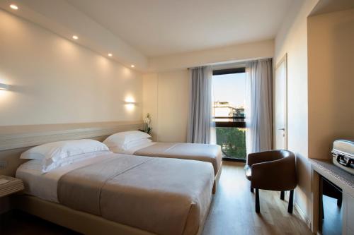 Habitación Triple del hotel Grifone Firenze