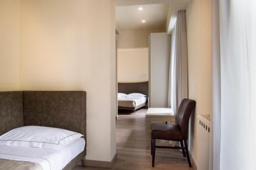 Habitación Triple Clásica - Anexo del hotel Grifone Firenze. Foto 3