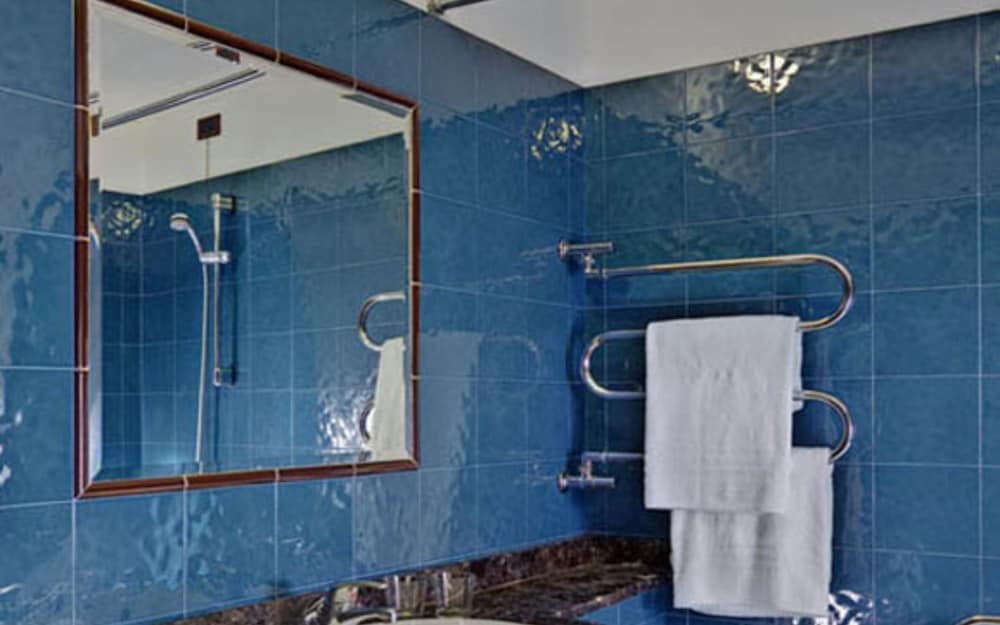 Habitación triple del hotel Corona D’italia. Foto 2
