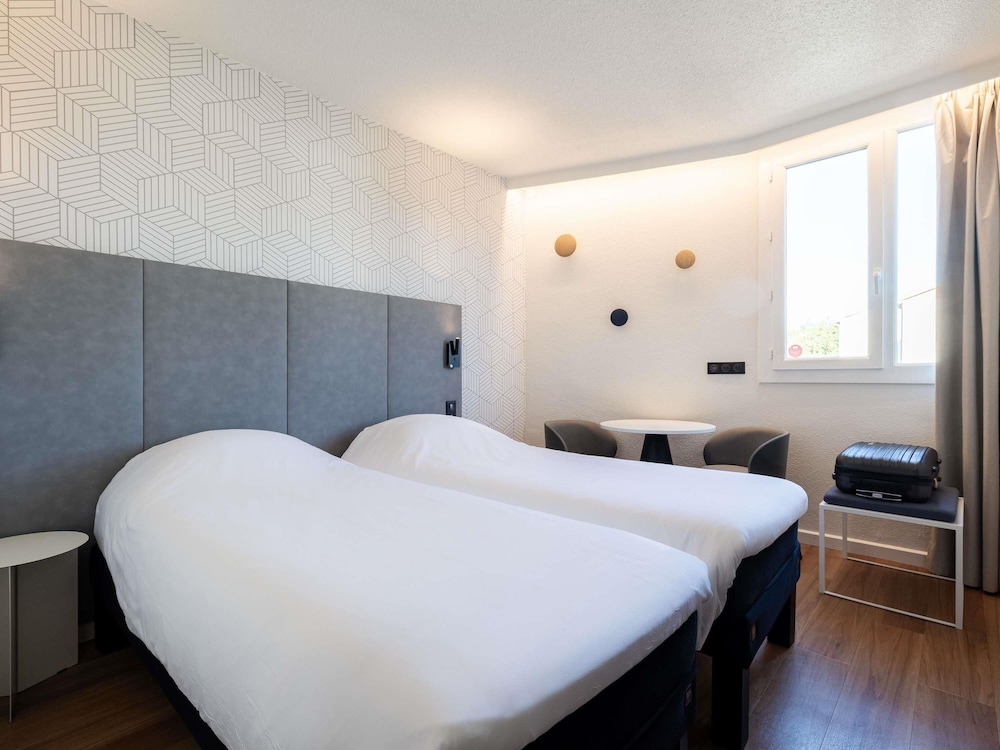 Habitación estándar con camas individuales del hotel Ibis Beziers East Mediterranee. Foto 5