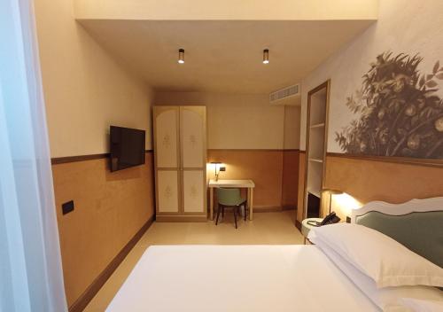 Habitación Doble Superior - planta baja del hotel Palazzo Ognissanti. Foto 9