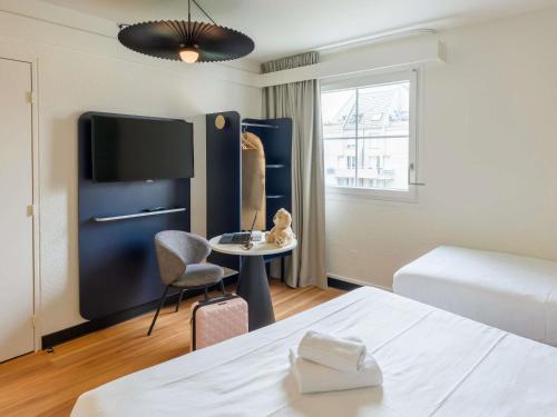 Habitación Doble Estándar del hotel Ibis Strasbourg Aéroport Le Zenith. Foto 2
