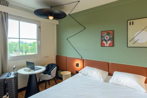Habitación Doble Estándar del hotel Ibis Strasbourg Aéroport Le Zenith. Foto 6