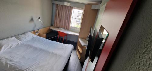 Habitación Doble Estándar del hotel Ibis Strasbourg Aéroport Le Zenith. Foto 13