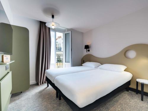 Habitación Doble Estándar - 2 camas del hotel Ibis Styles Paris Cadet Lafayette
