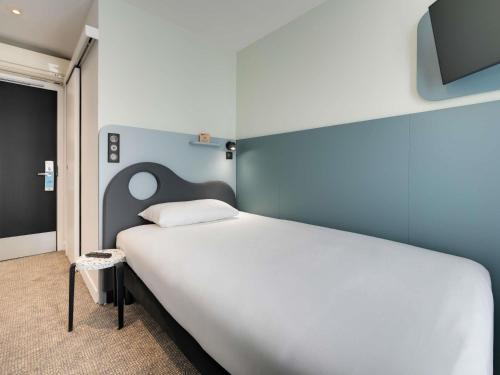Habitación Individual Estándar del hotel Ibis Styles Paris Cadet Lafayette. Foto 4