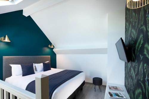 Habitación Triple del hotel Brady – Gare De L’est. Foto 2