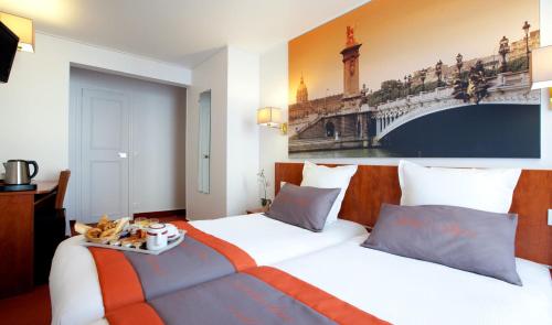 Habitación Doble - 2 camas del hotel Alyss Saphir Cambronne Eiffel. Foto 5