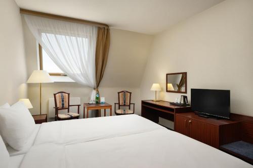 Habitación Doble Estándar - 2 camas del hotel Danubius Hungaria City Center. Foto 1