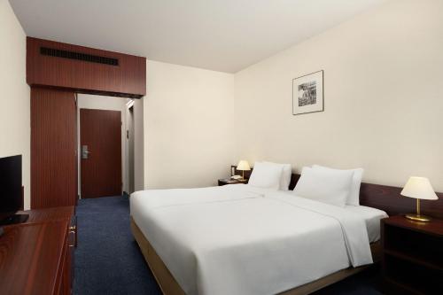 Habitación Doble Estándar - 2 camas del hotel Danubius Hungaria City Center. Foto 2