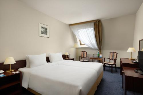 Habitación Doble Estándar - 2 camas del hotel Danubius Hungaria City Center. Foto 3