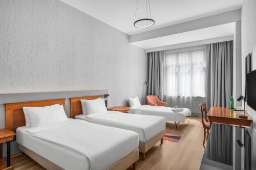 Habitación Doble Superior Plus - 2 camas del hotel Danubius Hungaria City Center. Foto 3