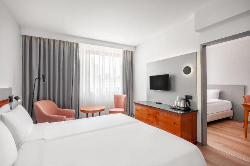 Habitación Triple Superior del hotel Danubius Hungaria City Center. Foto 1