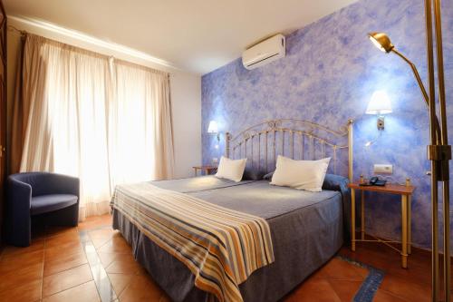 Habitación Doble Económica del hotel Guadalquivir. Foto 1