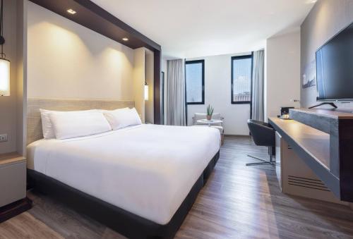 Habitación Premium del hotel Barcelona Condal Mar Affiliated By Meliá. Foto 3