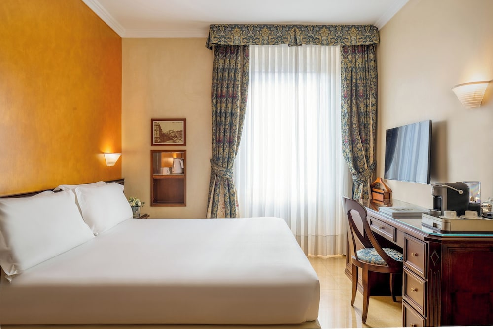 Habitación ejecutiva doble del hotel UNAHOTELS Galles Milano. Foto 2