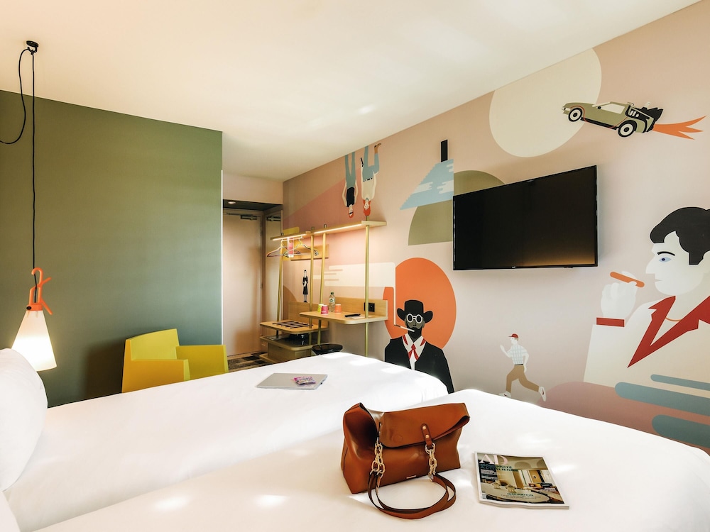 Habitación estándar con dos camas individuales del hotel ibis Styles Lyon Confluence. Foto 2