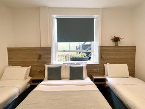 Habitación Executive - 2 camas grandes del hotel Griffin House. Foto 10