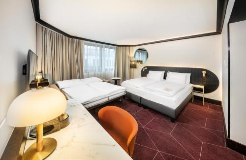 Suite Junior Familiar del hotel Vienna House By Wyndham Diplomat Prague. Foto 4
