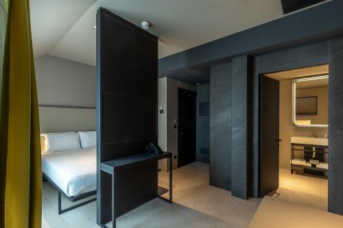 Habitación triple con balcón del hotel Scarlatti Hotel Milano. Foto 6