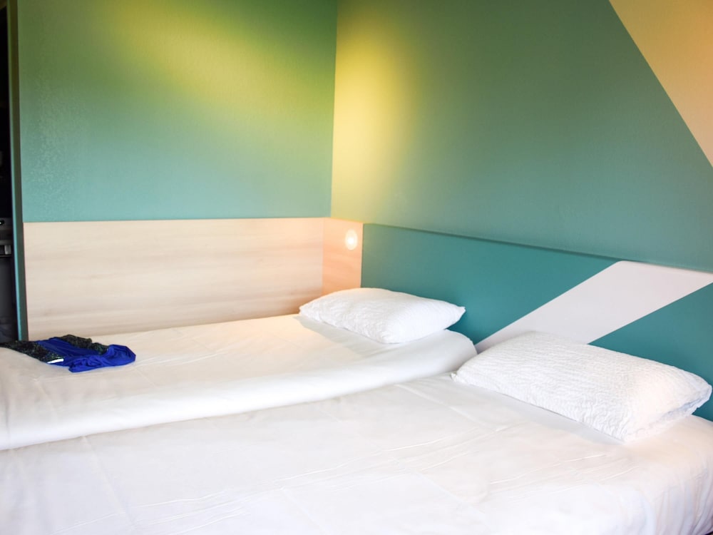 Habitación estándar con 2 camas individuales del hotel Ibis Budget Millau Viaduc