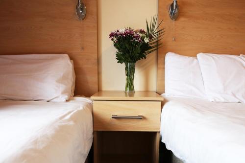 Habitación Triple del hotel City Inn Express. Foto 5