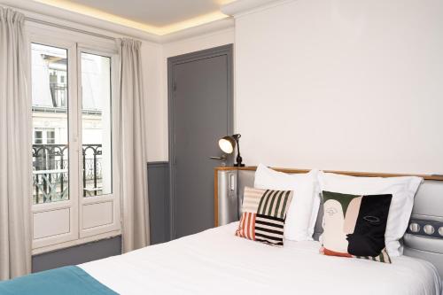 Habitación Acogedora del hotel Petit Lafayette. Foto 1