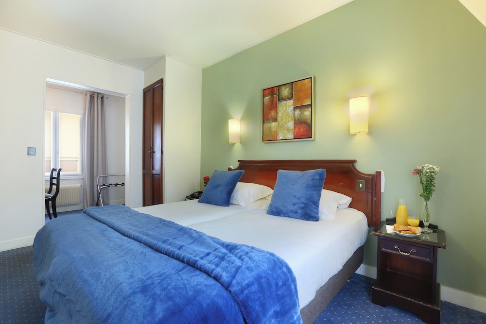 Habitación Confort con 2 camas individuales del hotel Beaugrenelle Tour Eiffel. Foto 1