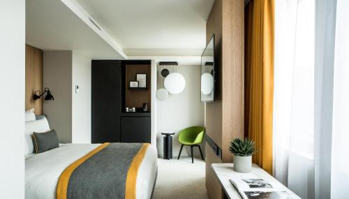 Dos habitaciones dobles adyacentes del hotel Mercure Paris 17 Batignolles. Foto 1