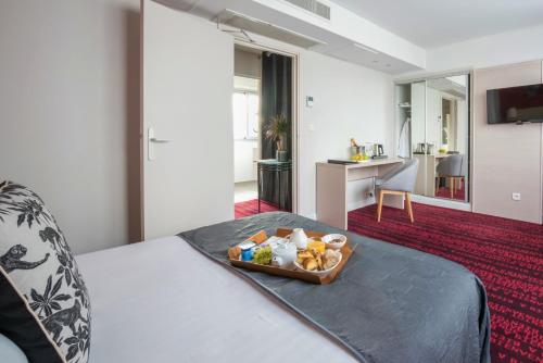 Habitación Deluxe del hotel Le Richemont. Foto 1