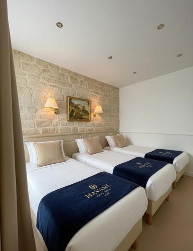 Habitación Triple del hotel Havane Opera. Foto 1