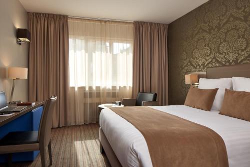 Habitación Doble Confort del hotel Timhotel Opera Blanche Fontaine. Foto 4