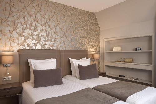 2 Habitaciones Dobles comunicadas del hotel Timhotel Opera Blanche Fontaine. Foto 3