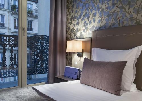 Habitación Individual Confort del hotel Timhotel Opera Blanche Fontaine. Foto 1
