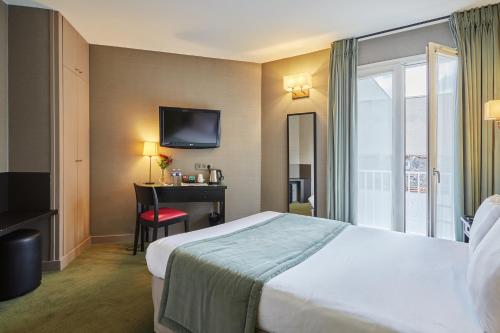Habitación Doble con vistas al jardín del hotel Orchidée. Foto 1