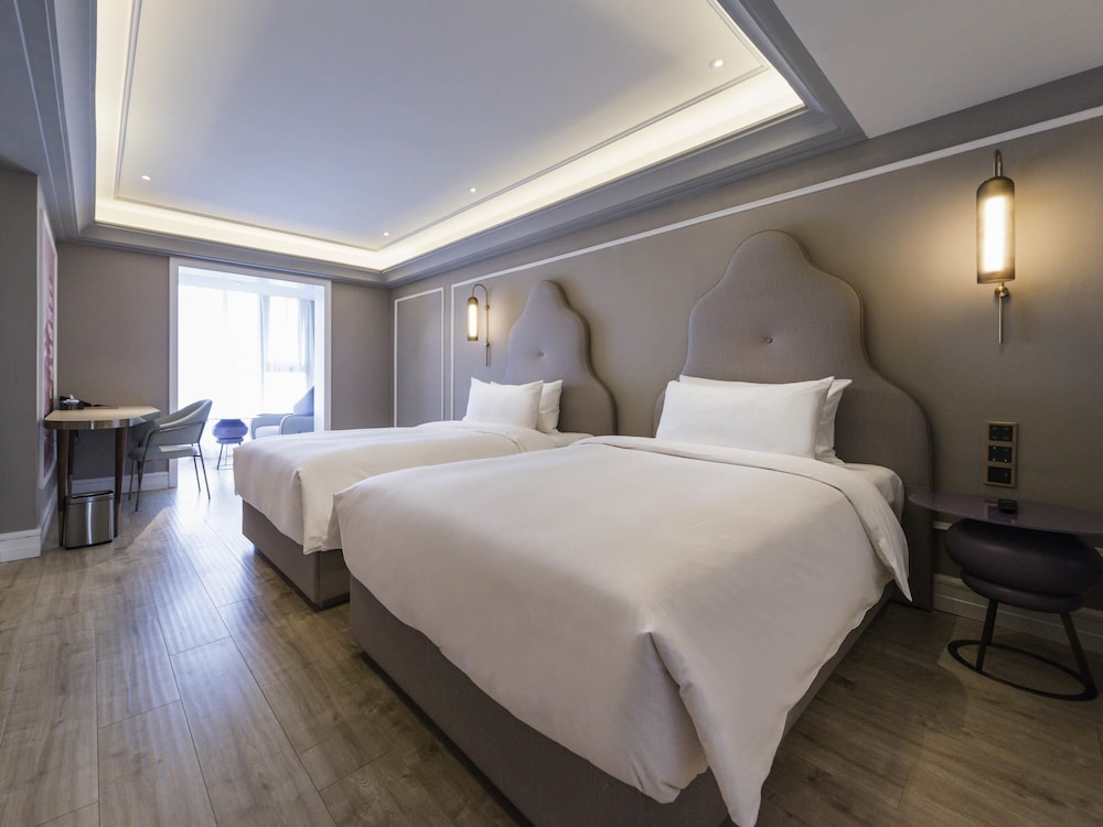 Habitación superior, 2 camas individuales del hotel Mercure Xi'an Downtown. Foto 1