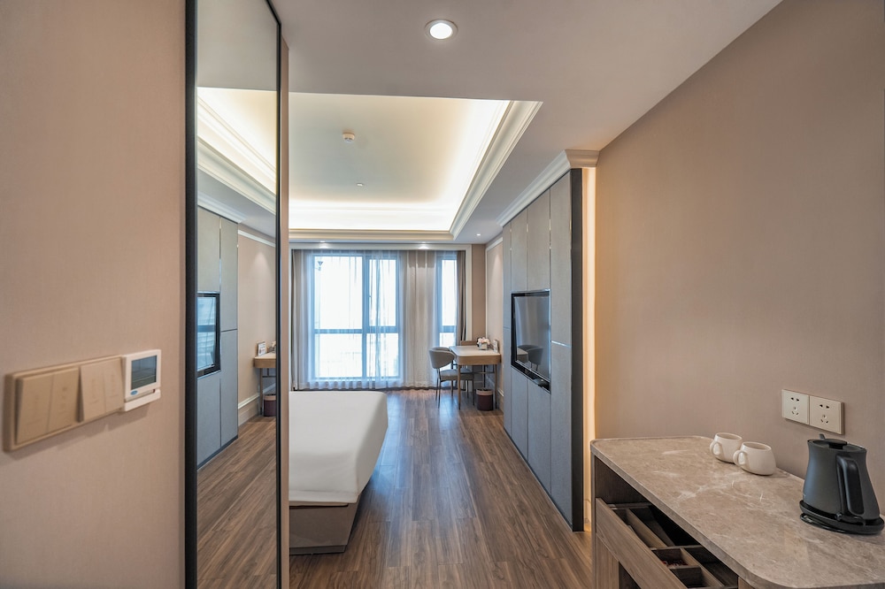 Habitación Deluxe con 1 cama king del hotel Mercure Hangzhou Liping. Foto 2