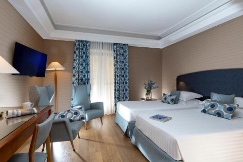 Habitación Doble Clásica - 1 o 2 camas del hotel Royal Continental Naples. Foto 1