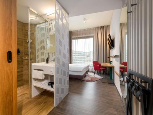 Habitación Doble Confort - 2 camas del hotel Mercure Zürich City. Foto 6