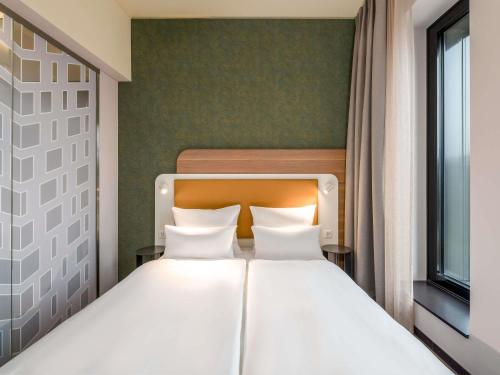 Habitación Doble Confort del hotel Mercure Zürich City. Foto 7