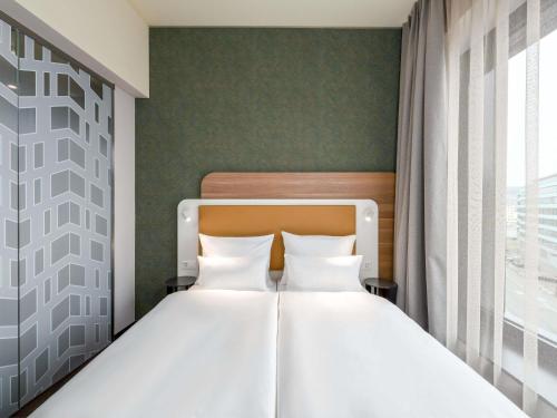 Habitación Doble Confort - 2 camas del hotel Mercure Zürich City. Foto 7