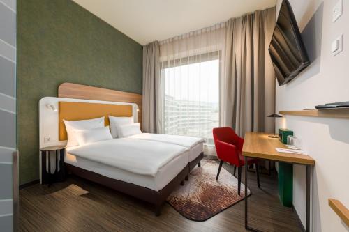 Habitación Doble Confort - 2 camas del hotel Mercure Zürich City. Foto 9