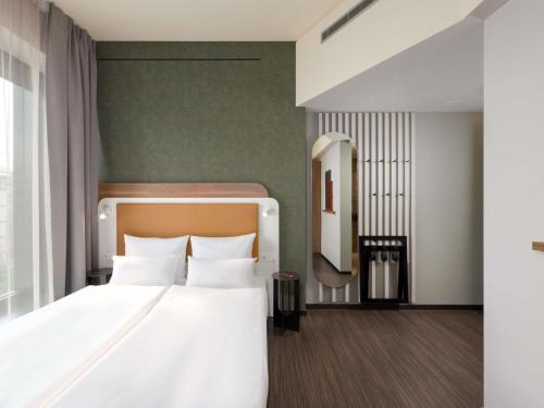 Habitación Comfort adaptada para personas con movilidad reducida - 1 cama grande del hotel Mercure Zürich City. Foto 8