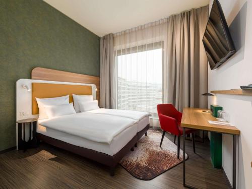 Habitación Doble Confort - 2 camas del hotel Mercure Zürich City. Foto 12