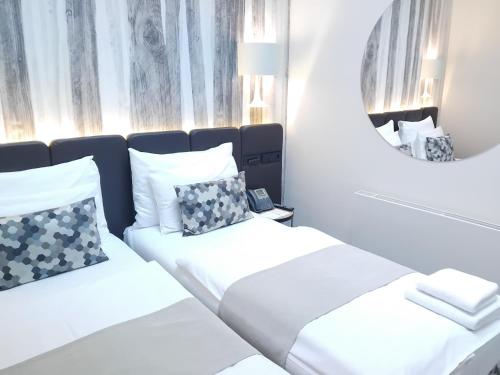 Habitación Doble Estándar - Ático - 1 o 2 camas del hotel Urban Creme. Foto 6